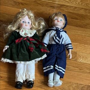 Classic Porcelain Doll Set with Green and Navy Outfits